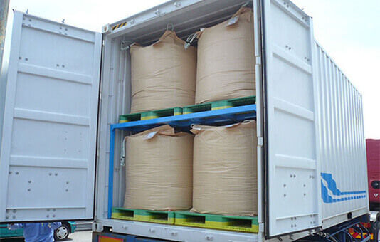 Dedicated racks enable flexible container bags to be stacked